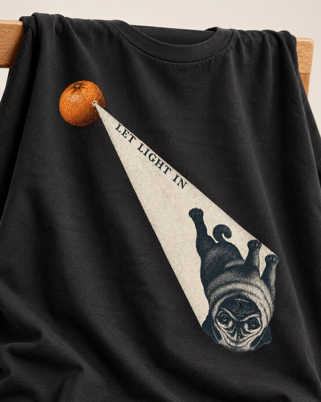 Pug Let Light In Camera Obscura Graphic T-Shirt in Black, close-up of the graphic