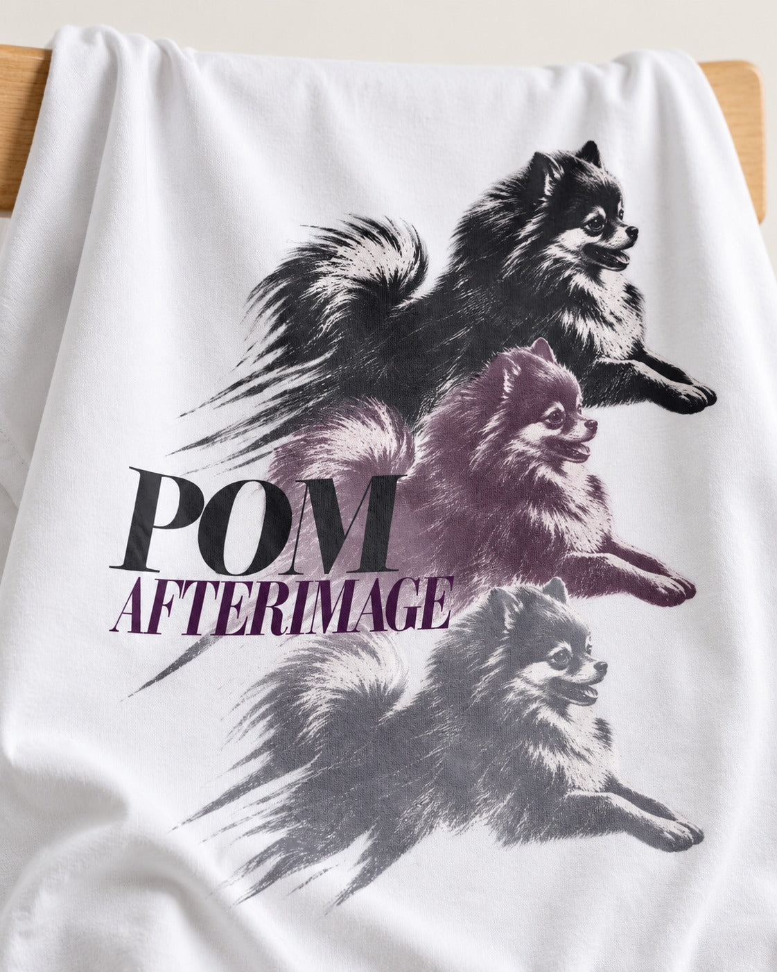 Pomeranian Afterimage T-Shirt in White, close-up of the graphic