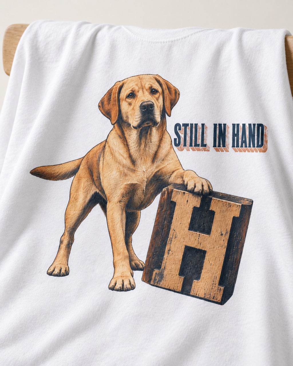 Labrador Retriever Still in Hand T-Shirt in White, close-up of the graphic