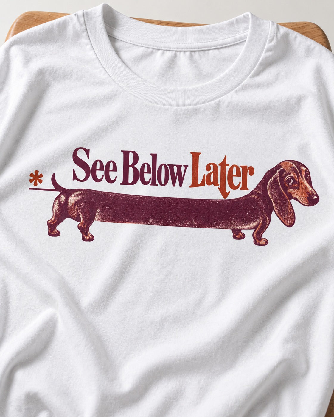 See Below Later Dachshund T-Shirt in White, close-up of the graphic