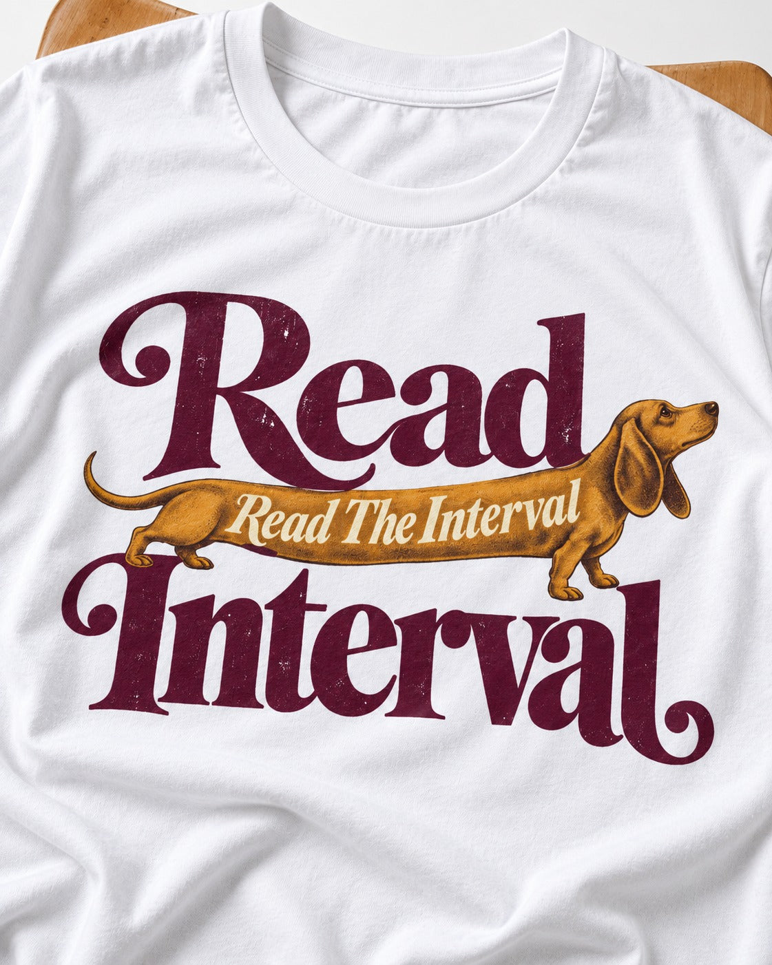 Read the Dachshund Interval T-Shirt in White, close-up of the graphic