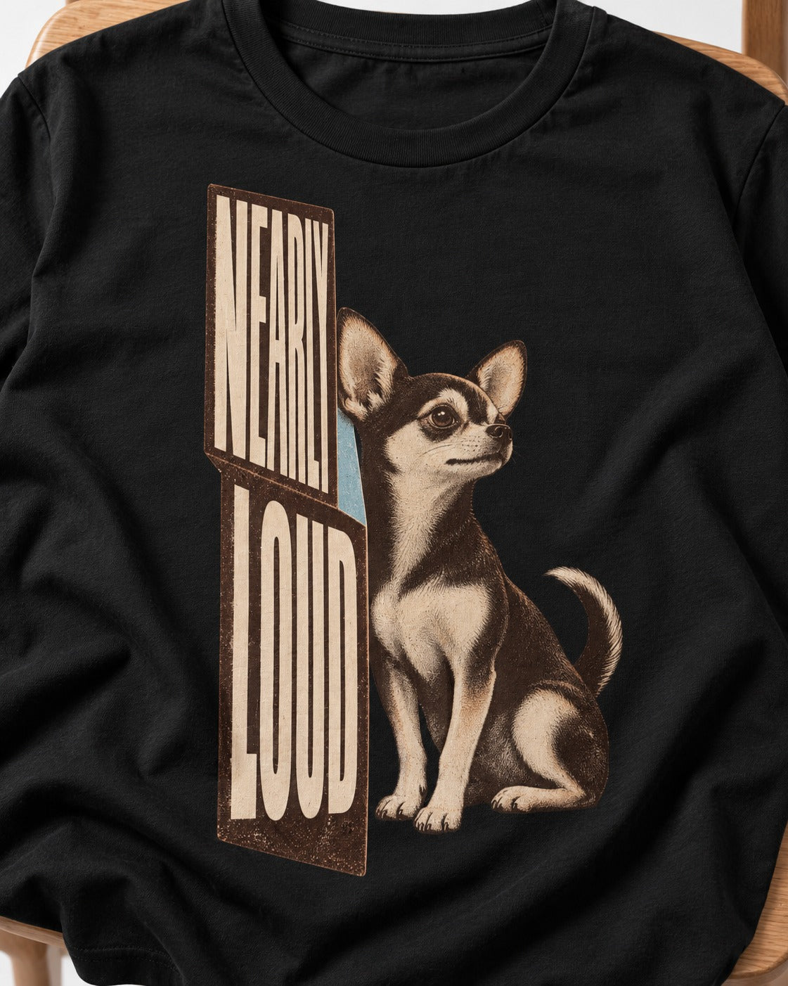 Chihuahua Never Loud T-Shirt in Black, close-up of the graphic