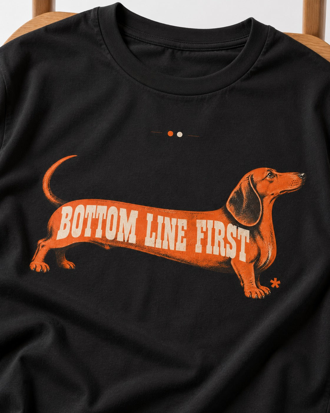 Dachshund Bottom Line First Body Lettering Graphic T-Shirt in Black, close-up of the graphic