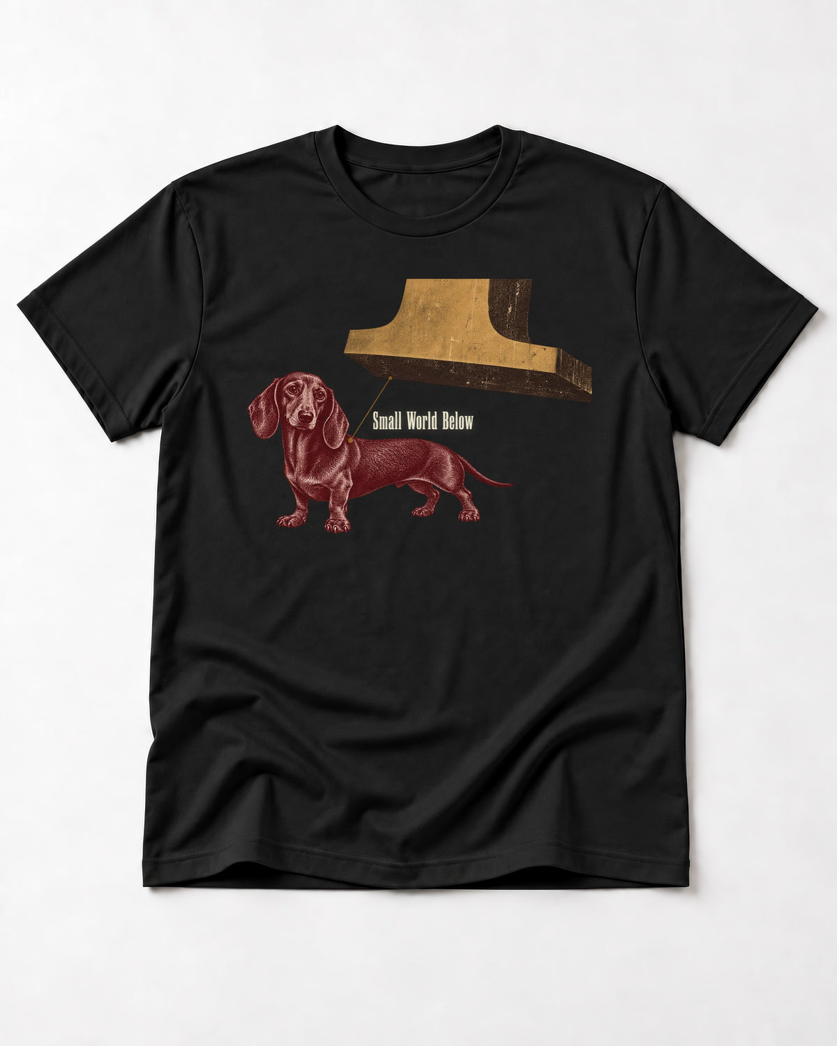 Dachshund Small World Below Giant Shoe Graphic T-Shirt in Black, flat lay product photo