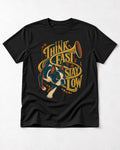 Boston Terrier Think Fast Stay Low T-Shirt in Black, flat lay product photo