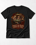 Frenchie Trust the Hand Under the Table Poker Dogs Graphic T-Shirt in Black, flat lay product photo