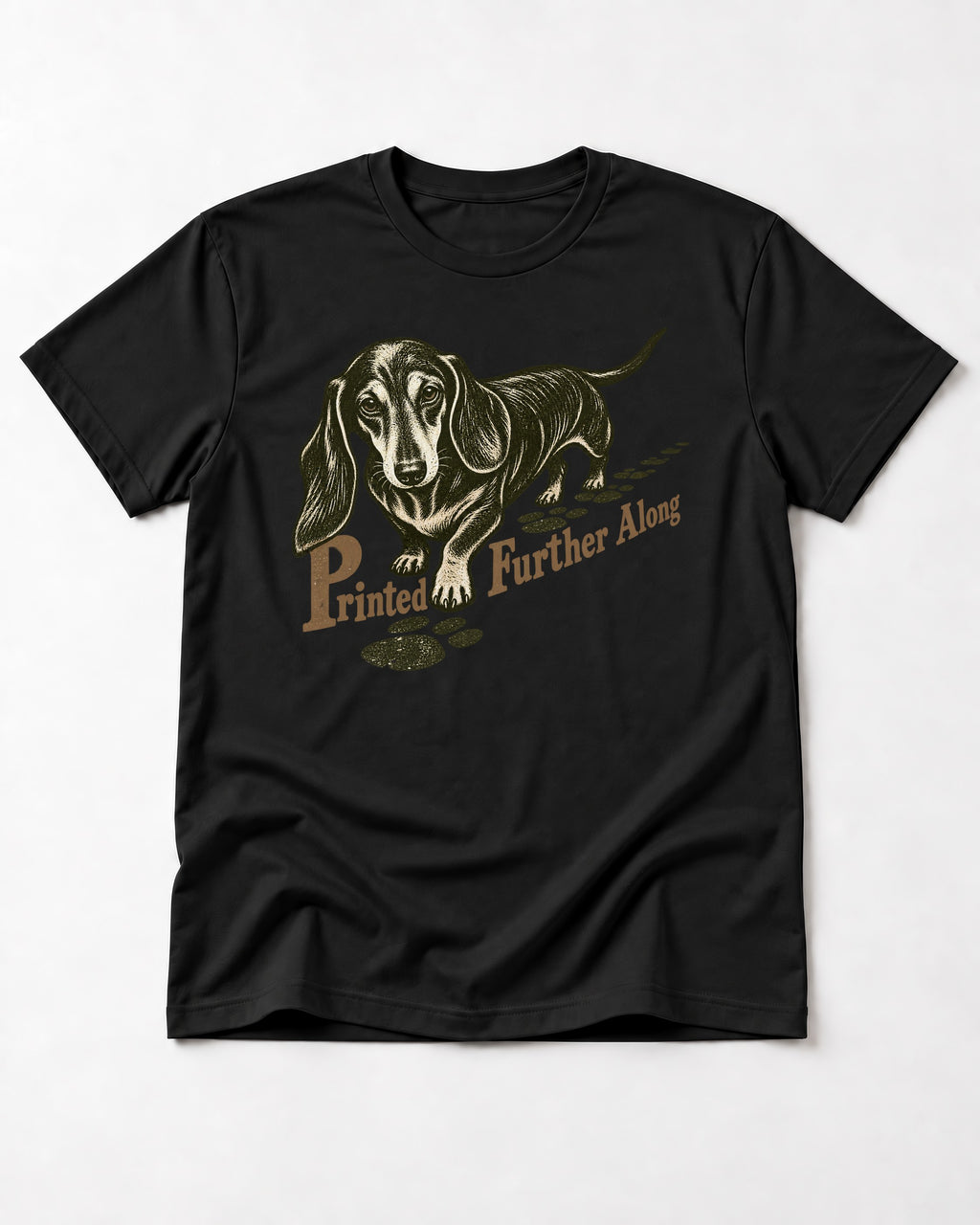 Dachshund Printed Further Along Footprint Graphic T-Shirt in Black, flat lay product photo