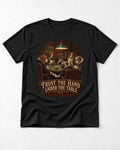 Pug Trust the Hand Under the Table Poker Graphic T-Shirt in Black, flat lay product photo