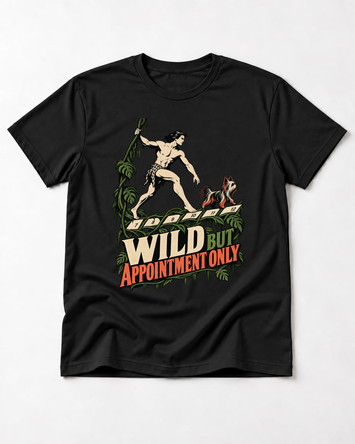 Yorkshire Terrier Wild but Appointment Only Jungle Calendar Graphic T-Shirt in Black, flat lay product photo