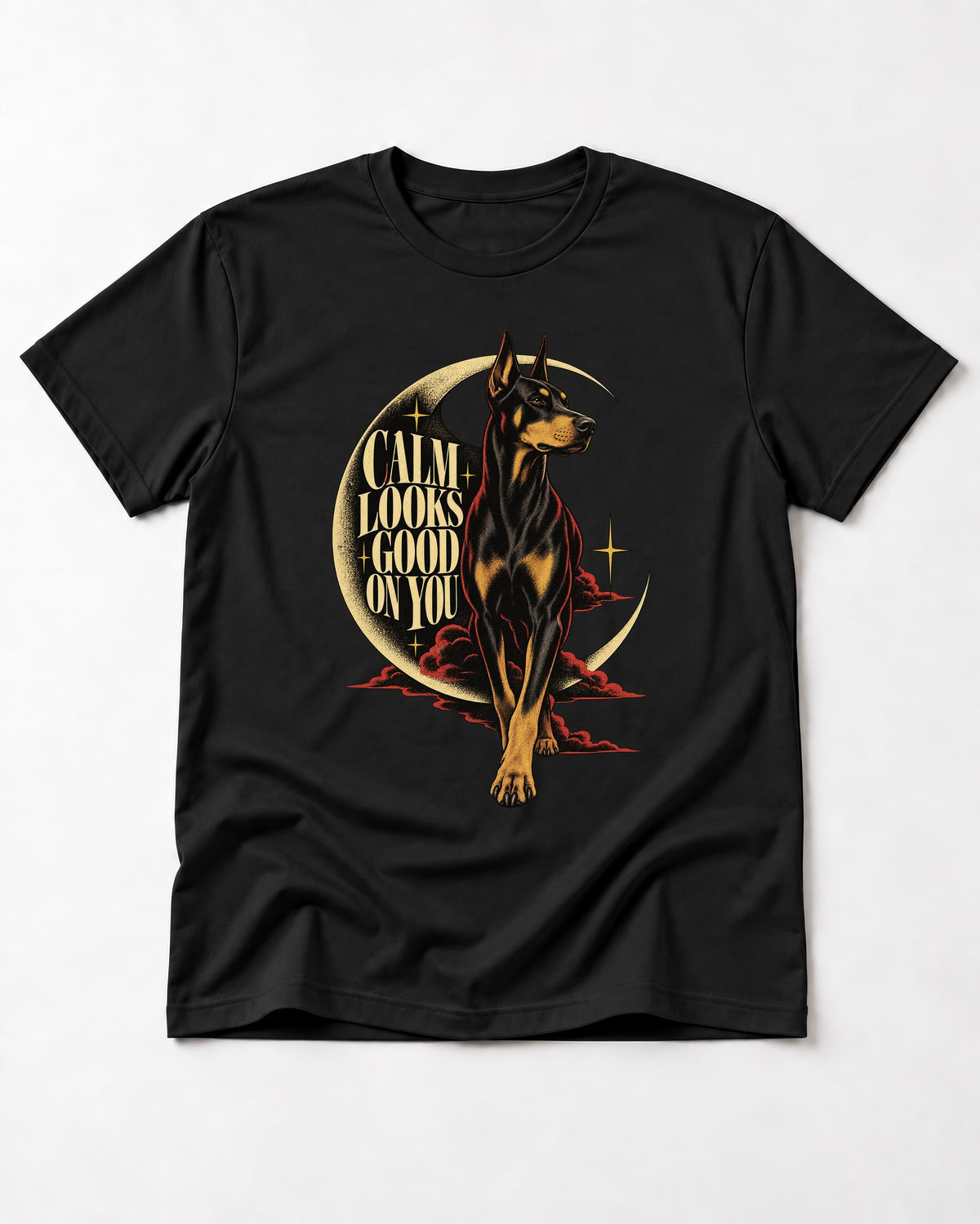 Doberman Calm Looks Good on You Crescent Graphic T-Shirt in Black, flat lay product photo