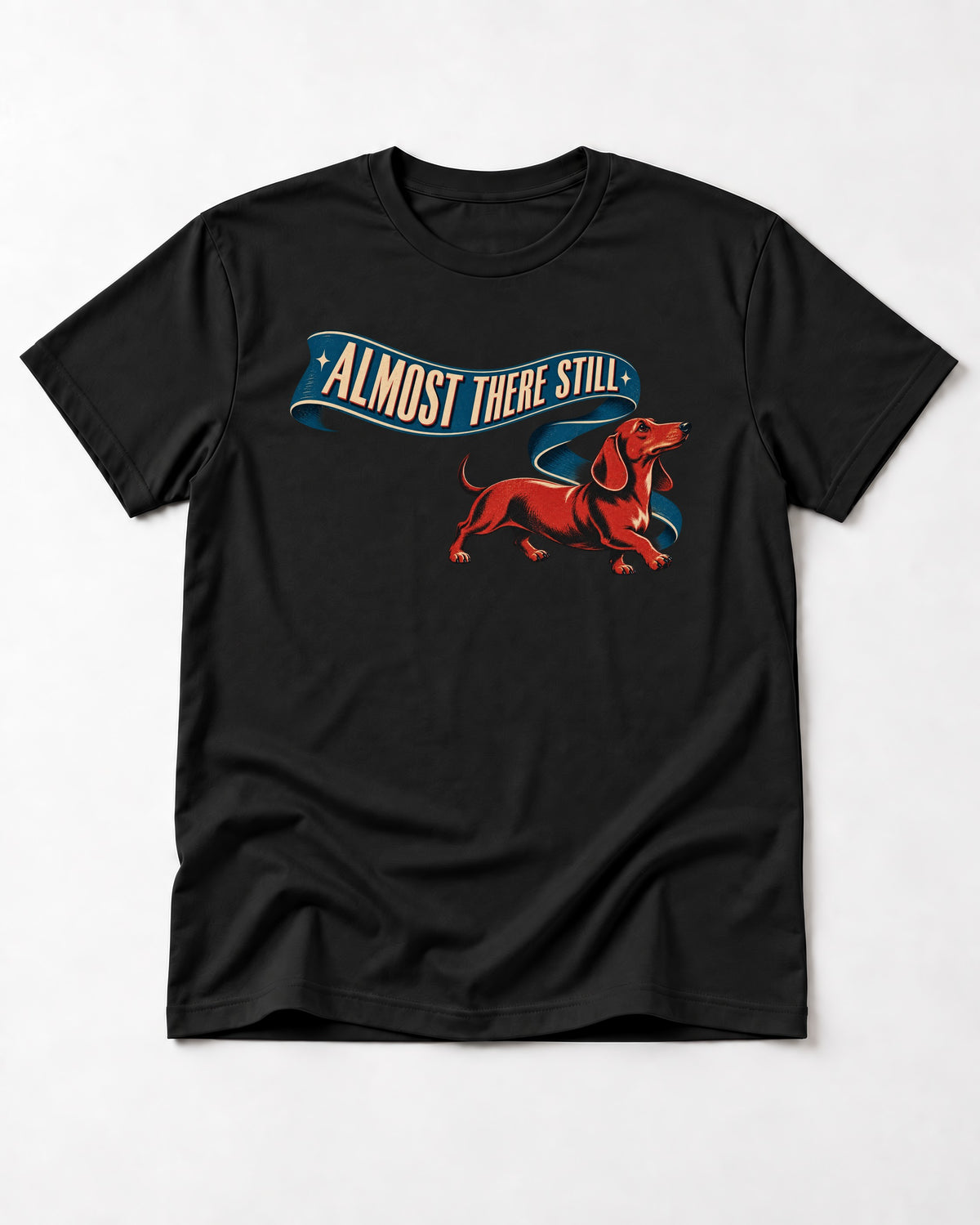 Dachshund Almost There Still Ribbon Graphic T-Shirt in Black, flat lay product photo