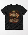 Labrador Retriever Trust the Hand Under the Table Poker Dogs Graphic T-Shirt in Black, flat lay product photo