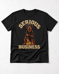 Rottweiler Serious Business Ball Under Paw Graphic T-Shirt in Black, flat lay product photo