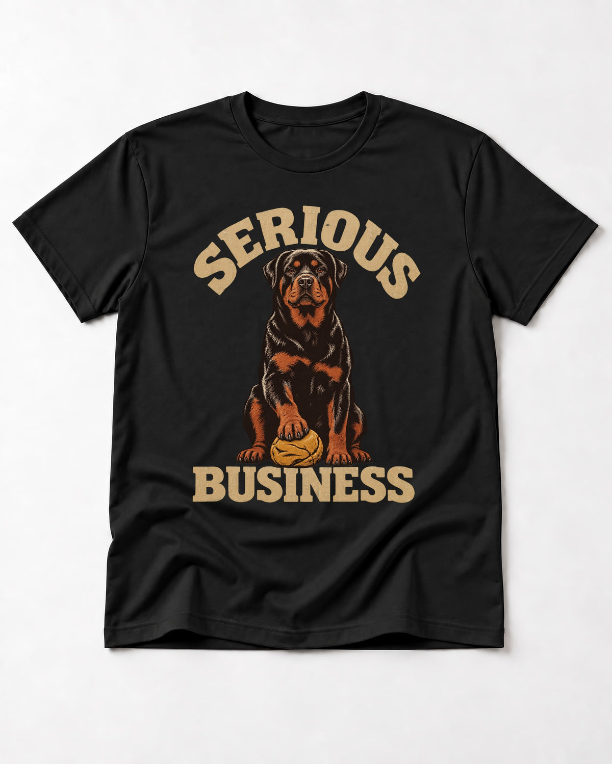 Rottweiler Serious Business Ball Under Paw Graphic T-Shirt in Black, flat lay product photo