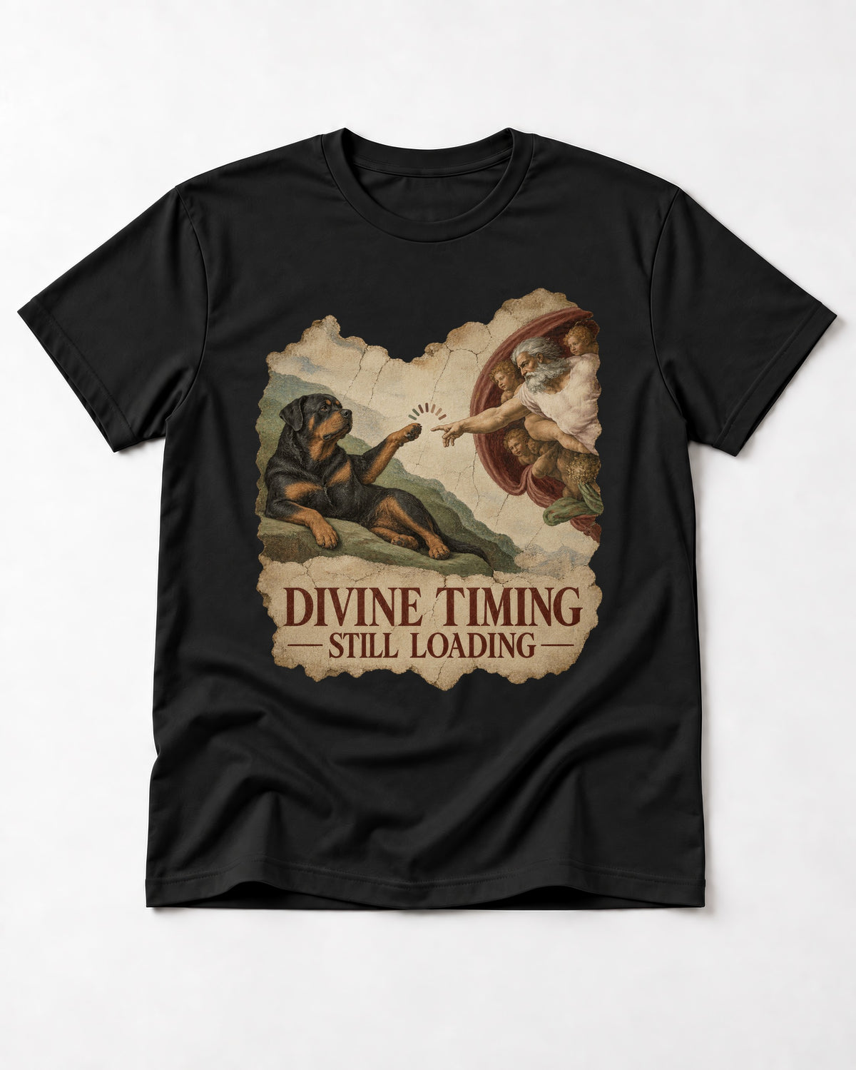 Rottweiler Divine Timing Still Loading Creation Parody Graphic T-Shirt in Black, flat lay product photo