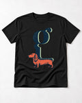 Dachshund Room Below Words Lowercase G Graphic T-Shirt in Black, flat lay product photo