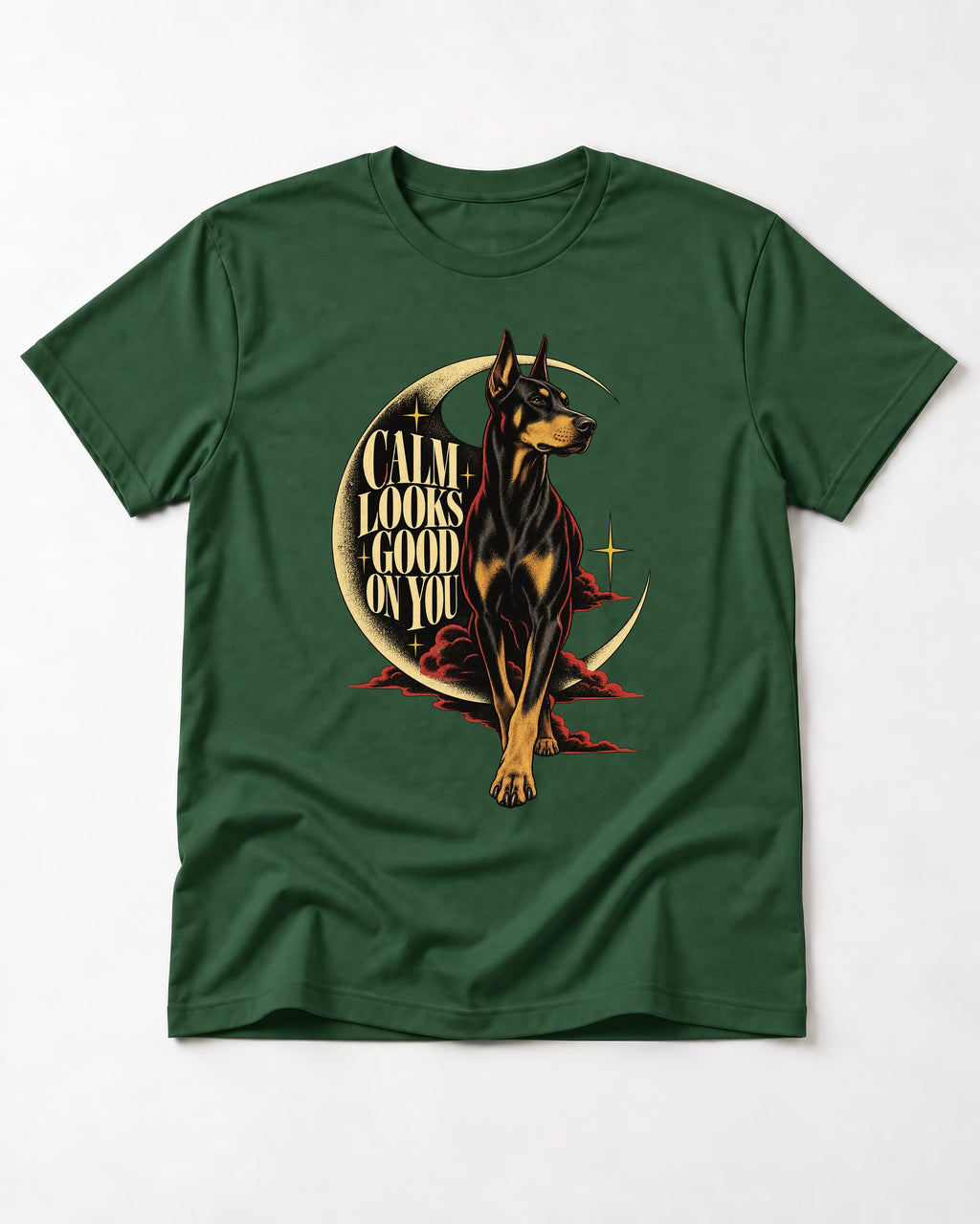 Doberman Calm Looks Good on You Crescent Graphic T-Shirt in Forest Green, flat lay product photo