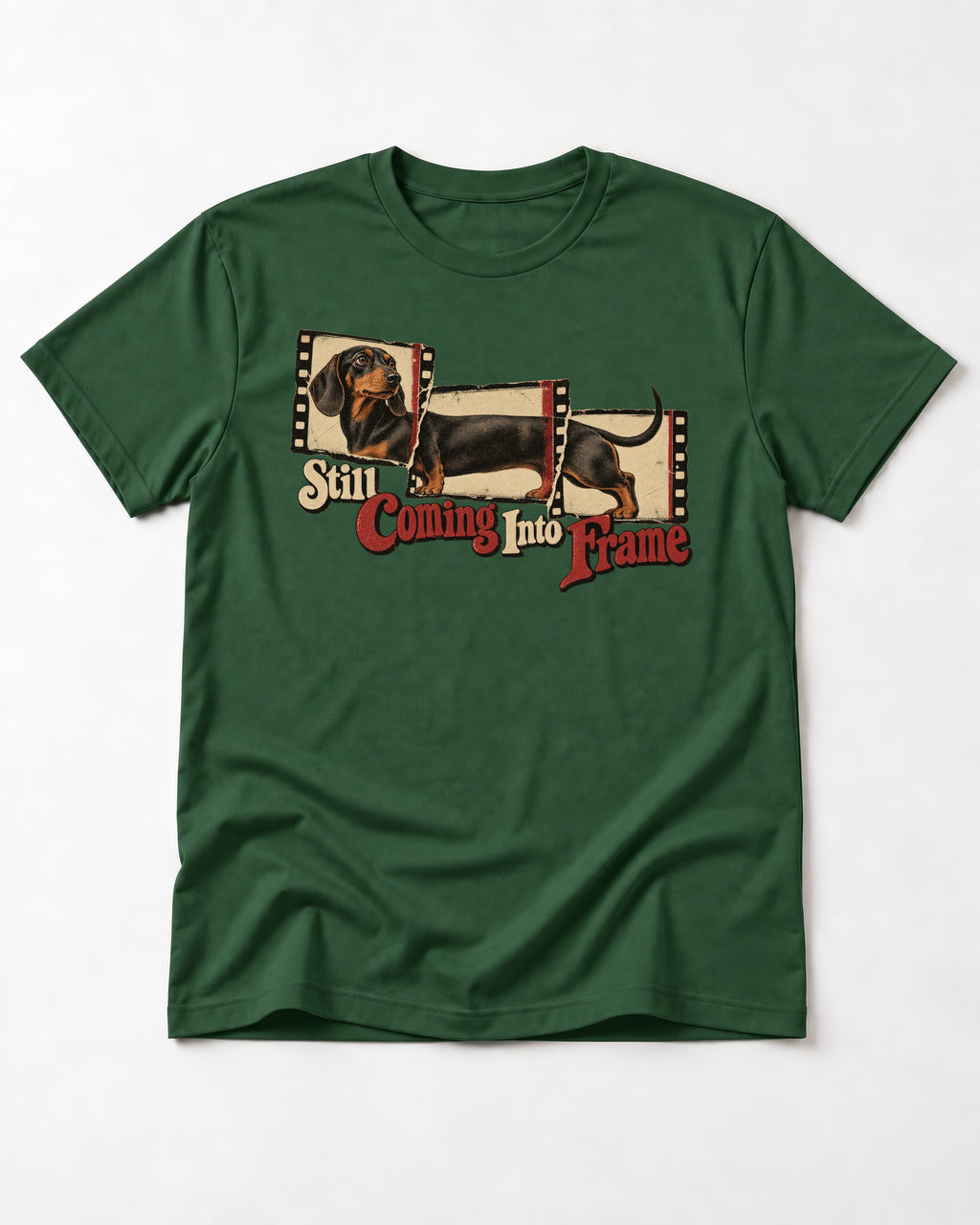 Dachshund Still Coming Into Frame Vintage Filmstrip Graphic T-Shirt in Forest Green, flat lay product photo