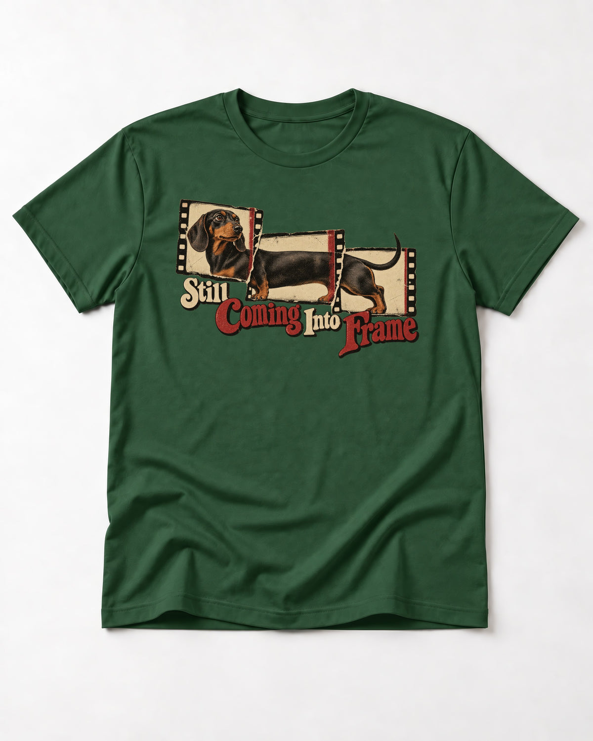 Dachshund Still Coming Into Frame Vintage Filmstrip Graphic T-Shirt in Forest Green, flat lay product photo