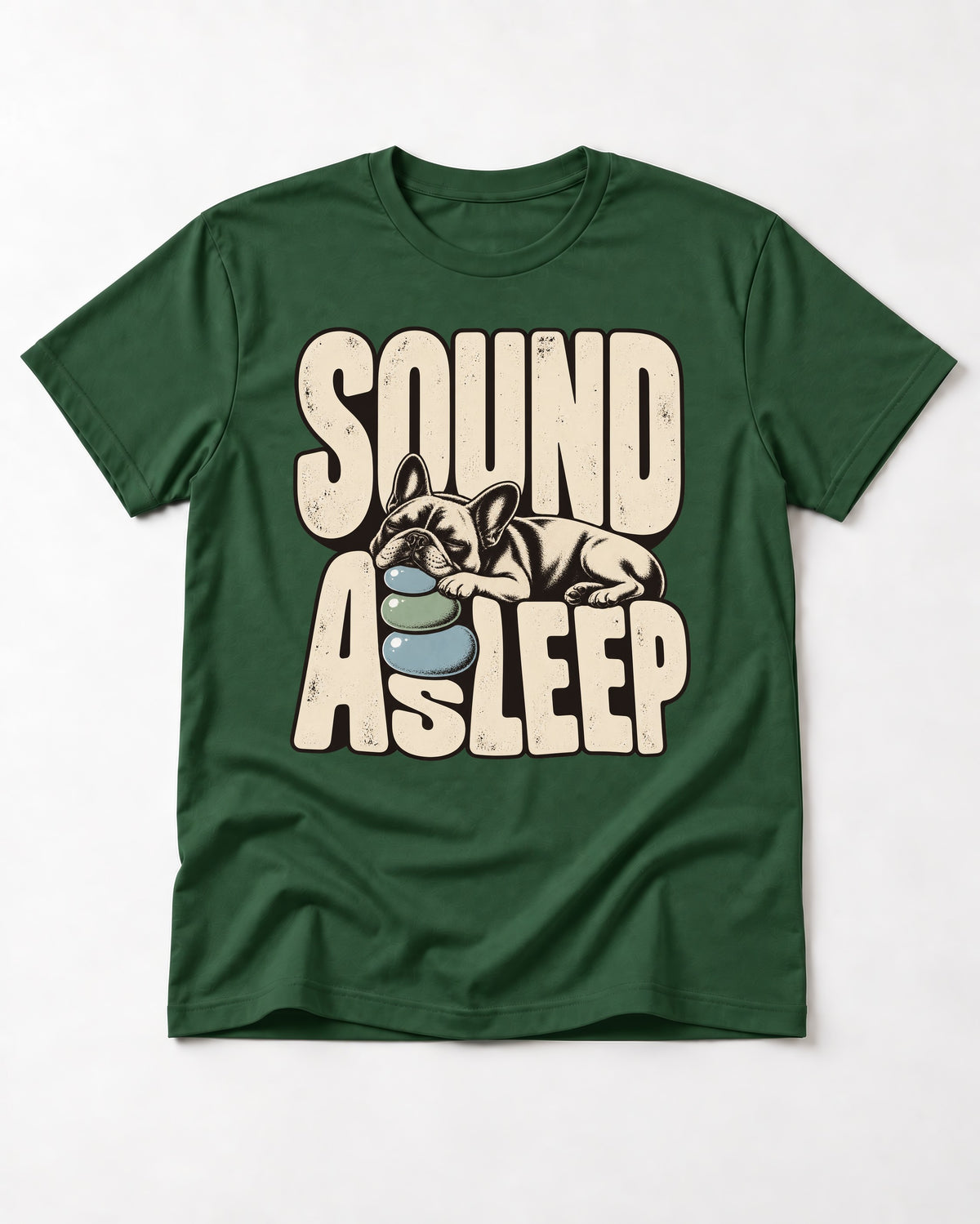 Frenchie Sound Asleep Stone Pillow Graphic T-Shirt in Forest Green, flat lay product photo