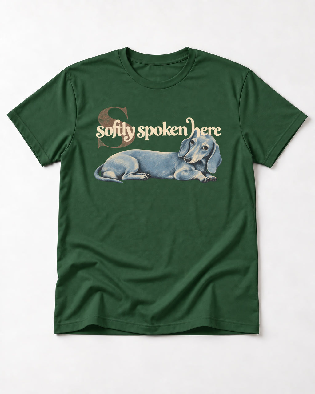 Dachshund Softly Spoken Here Reclining Portrait Graphic T-Shirt in Forest Green, flat lay product photo