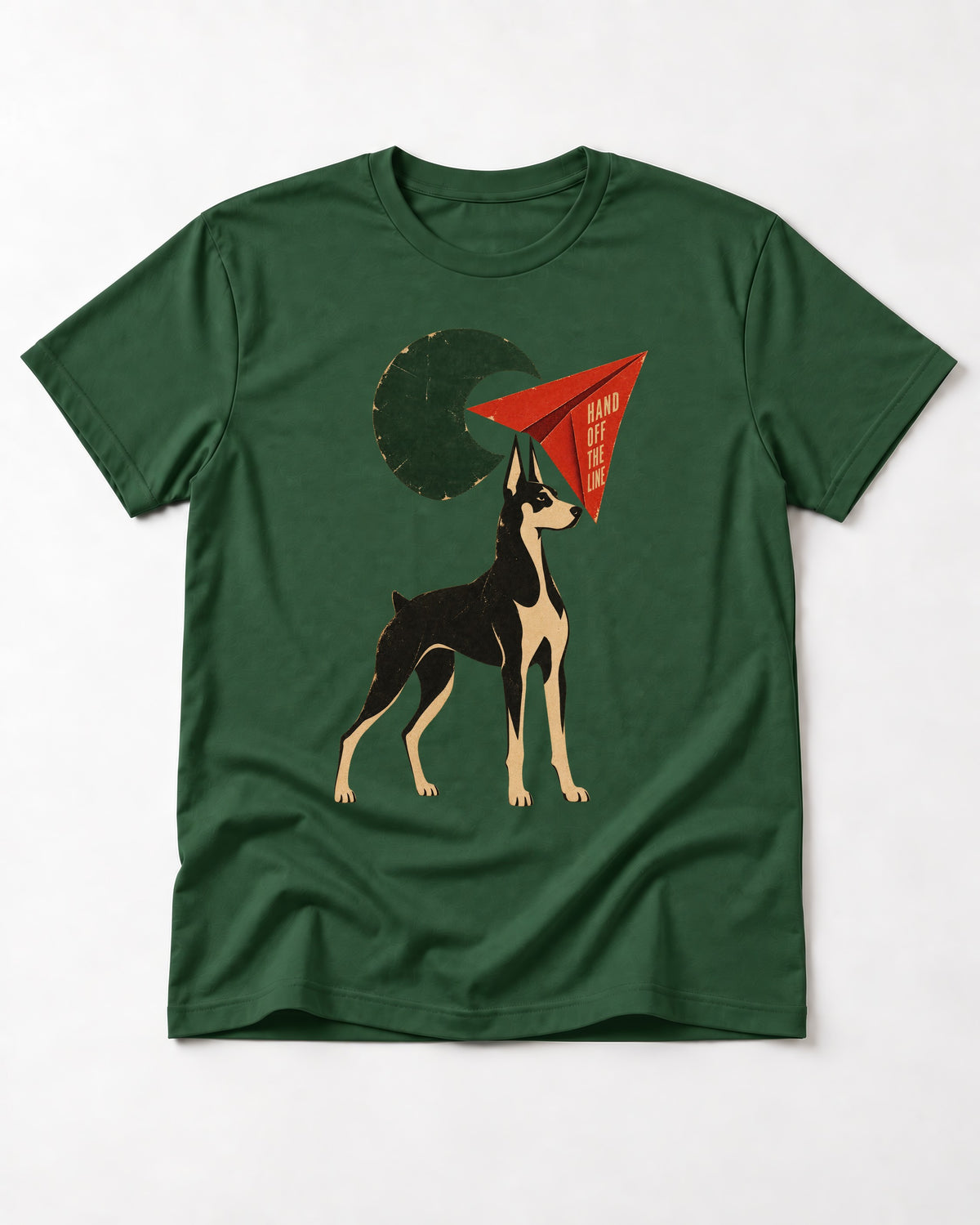 Doberman Hand Off the Line Paper Plane Graphic T-Shirt in Forest Green, flat lay product photo
