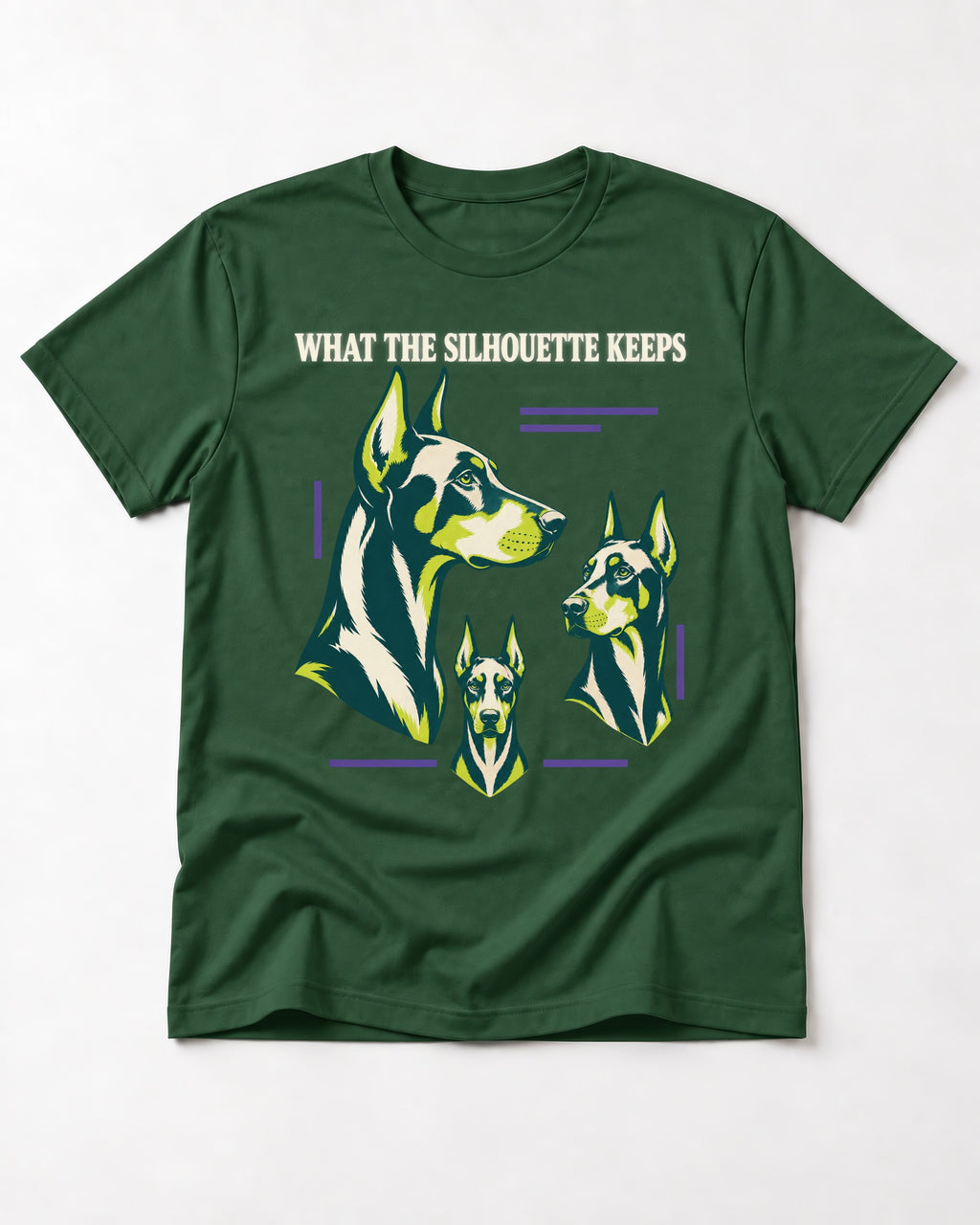 Doberman What the Silhouette Keeps Three Portrait Graphic T-Shirt in Forest Green, flat lay product photo
