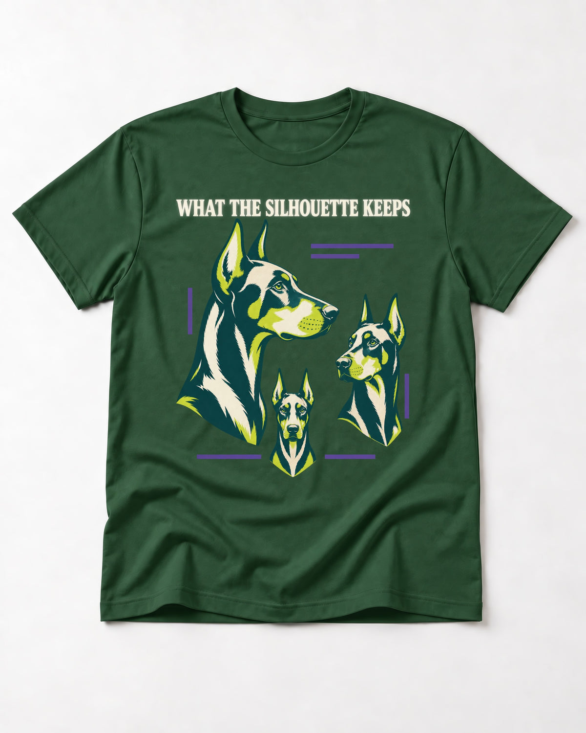 Doberman What the Silhouette Keeps Three Portrait Graphic T-Shirt in Forest Green, flat lay product photo