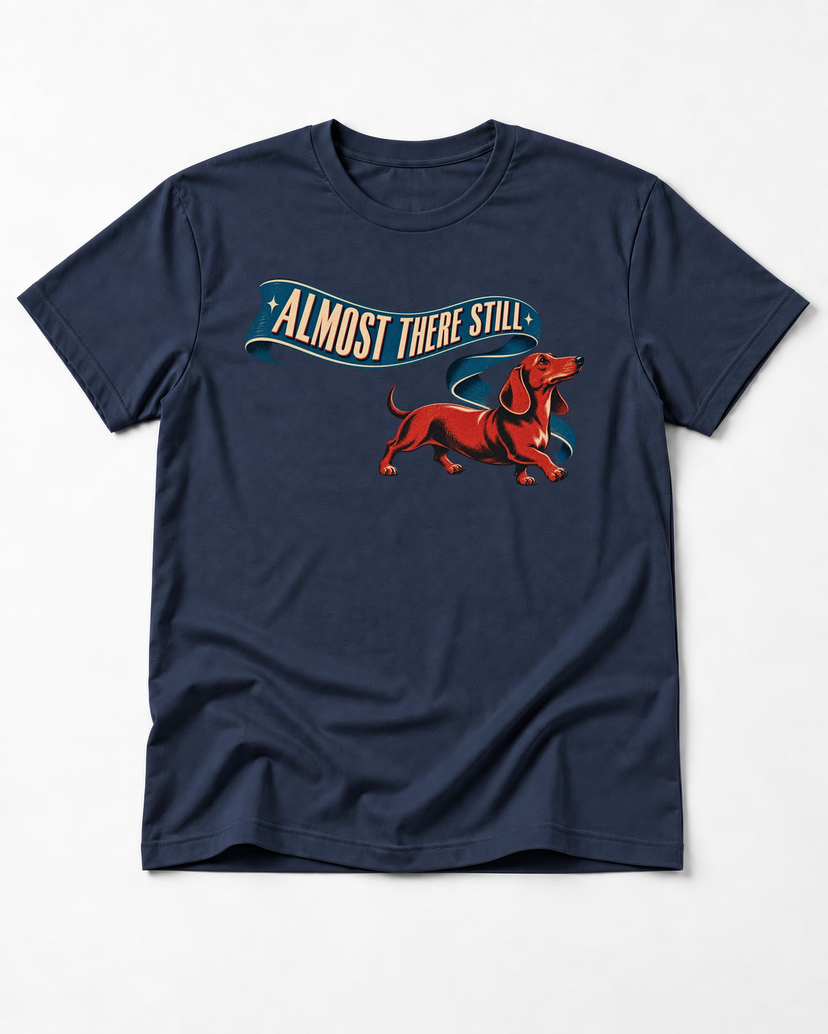 Dachshund Almost There Still Ribbon Graphic T-Shirt in Navy, flat lay product photo