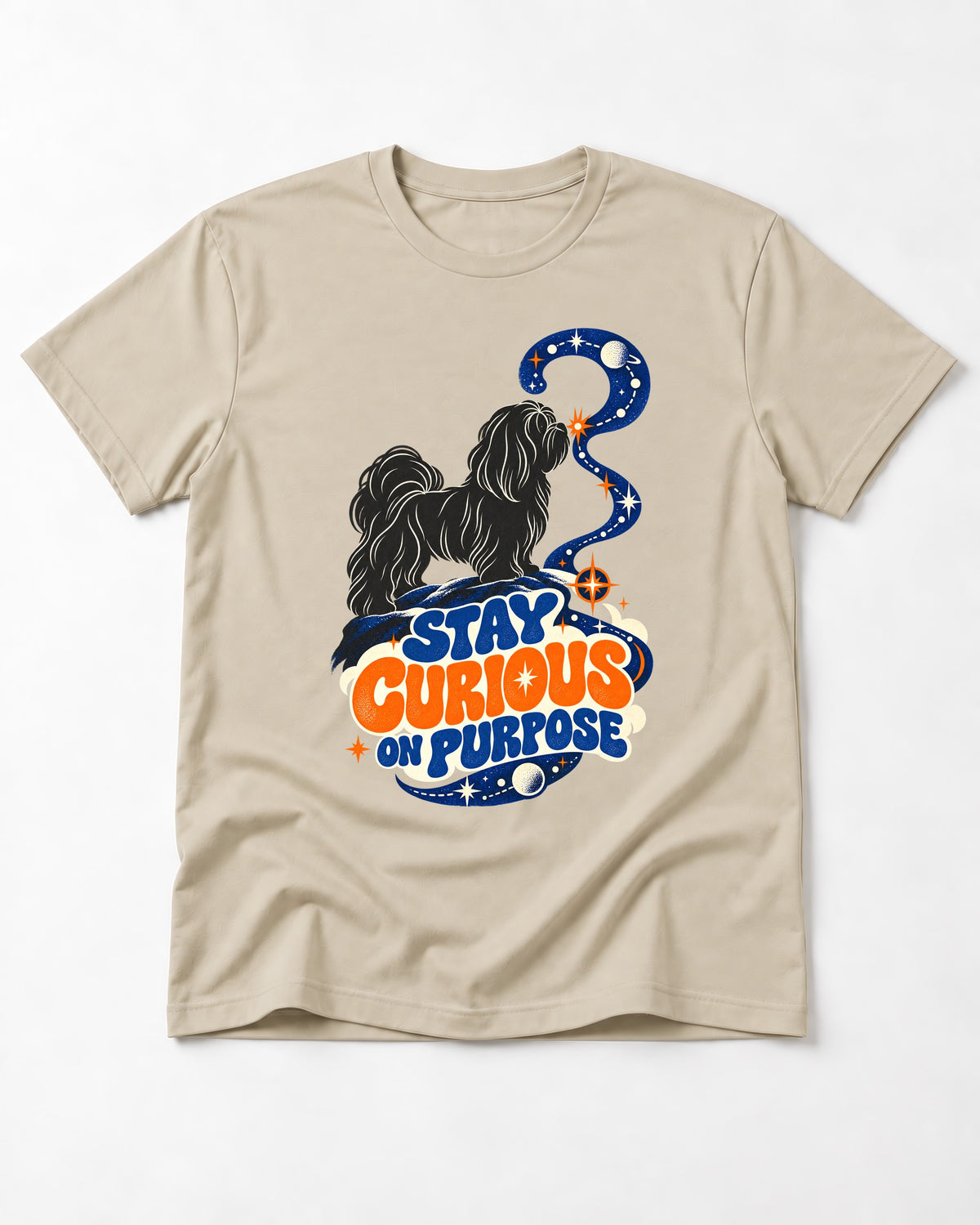 Stay Curious on Purpose Shih Tzu T-Shirt in Sand, flat lay product photo