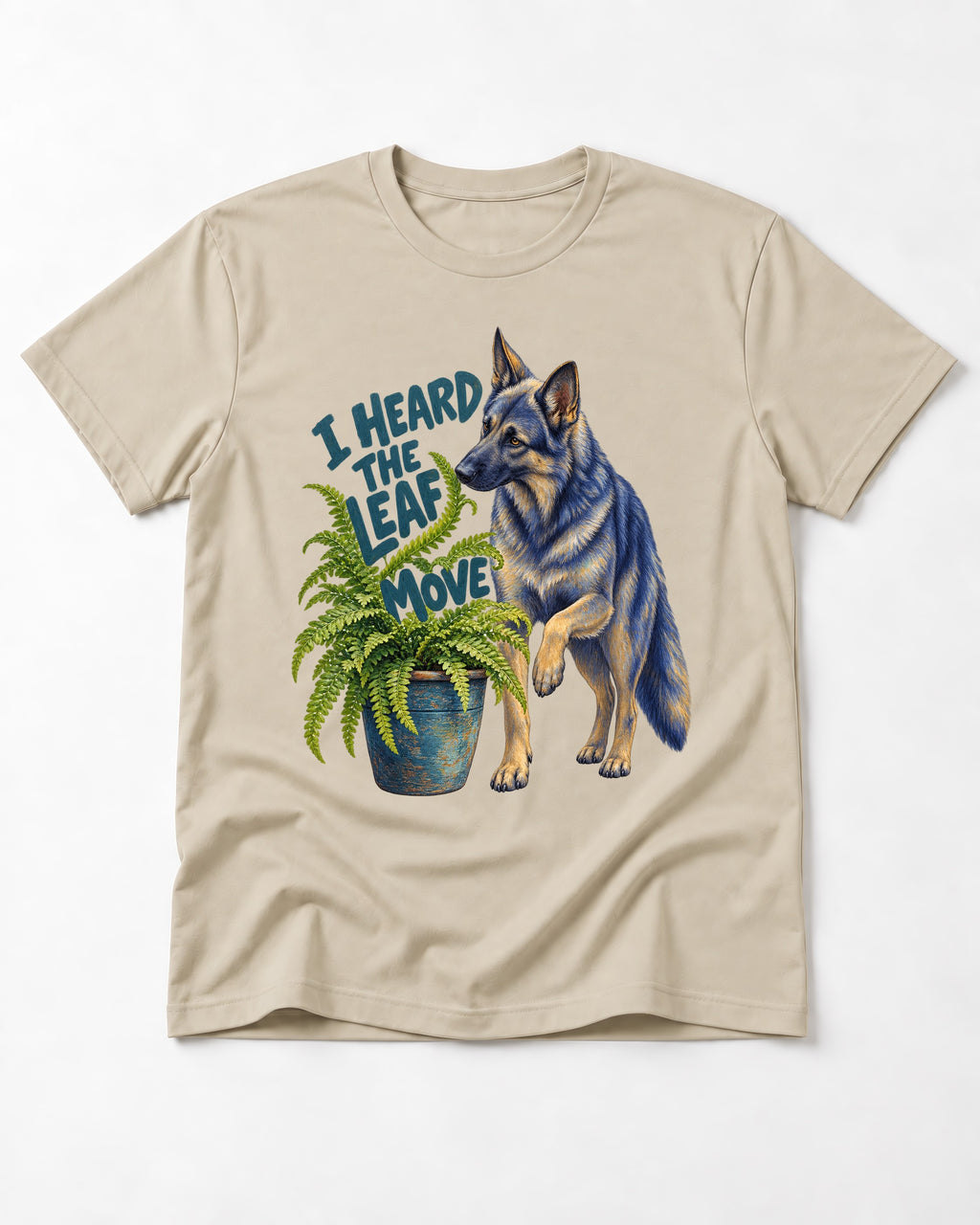 German Shepherd Dog Heard the Leaf Move T-Shirt in Sand, flat lay product photo