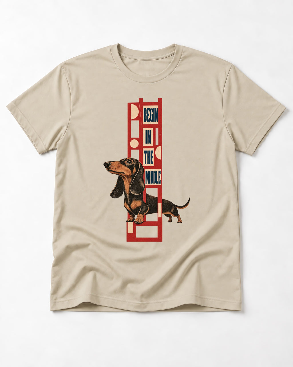 Dachshund Begins in the Middle T-Shirt in Sand, flat lay product photo