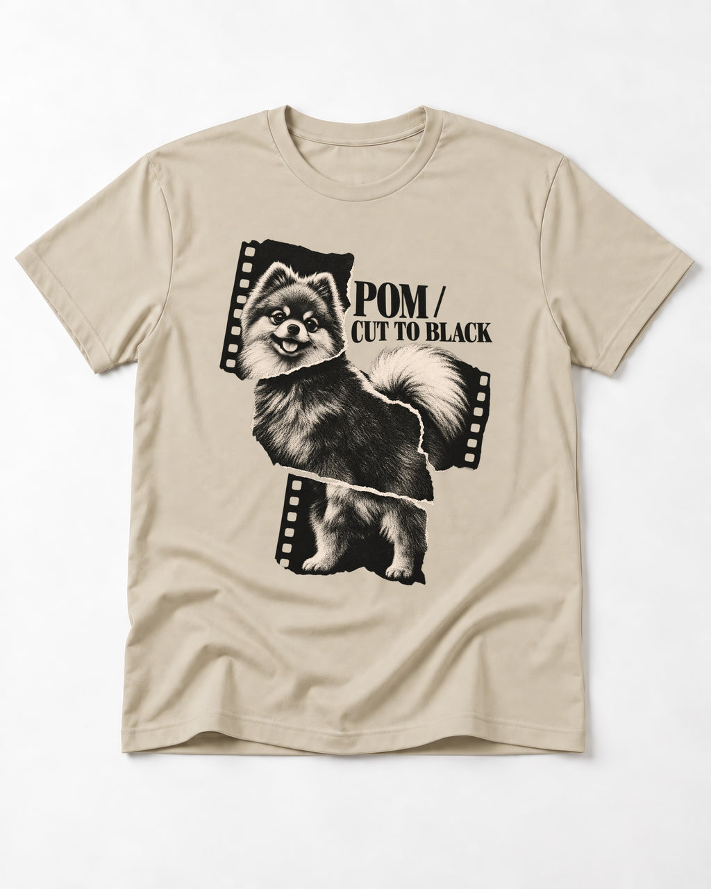 Pomeranian Cut to Black T-Shirt in Sand, flat lay product photo