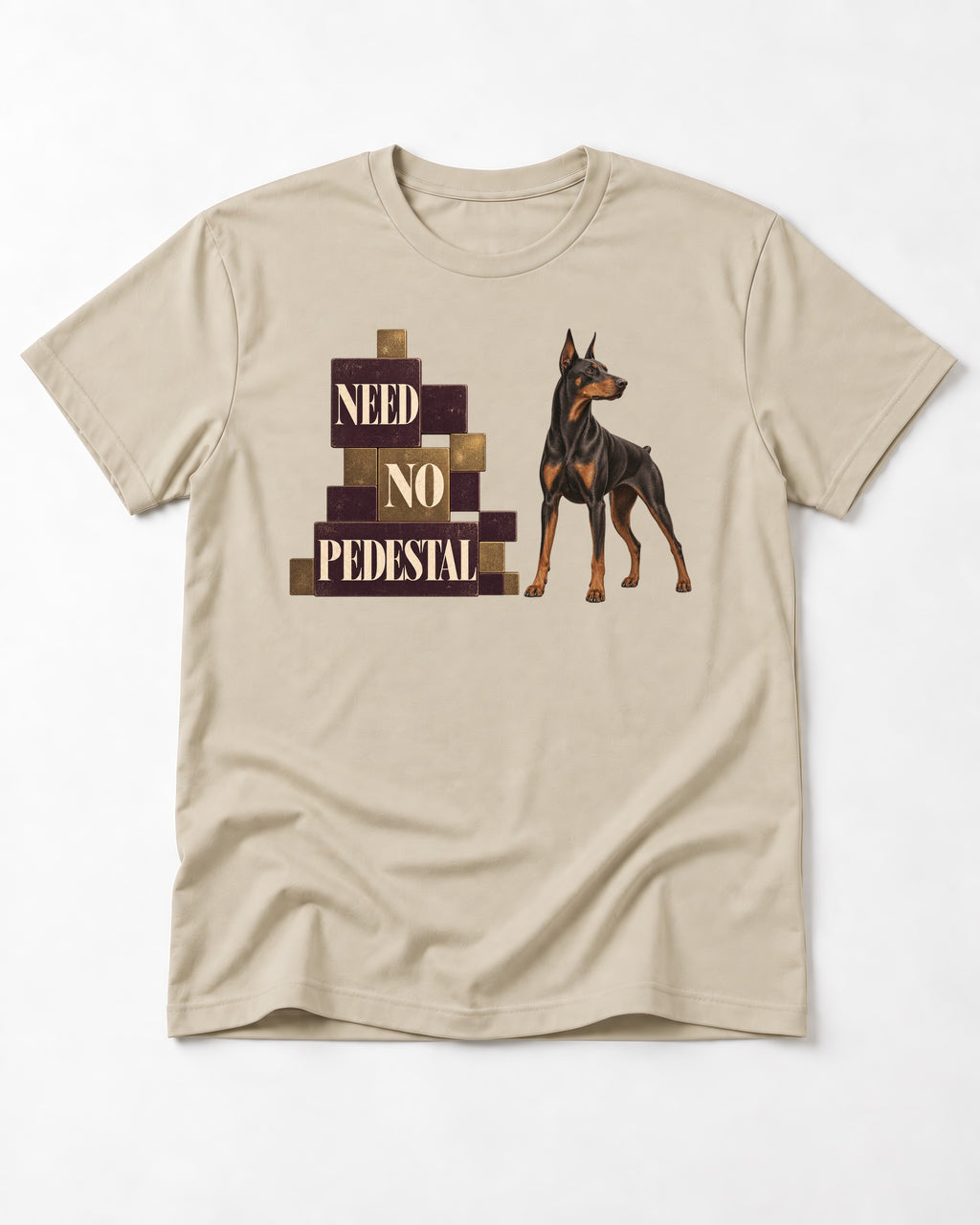 Doberman Need No Pedestal T-Shirt in Sand, flat lay product photo