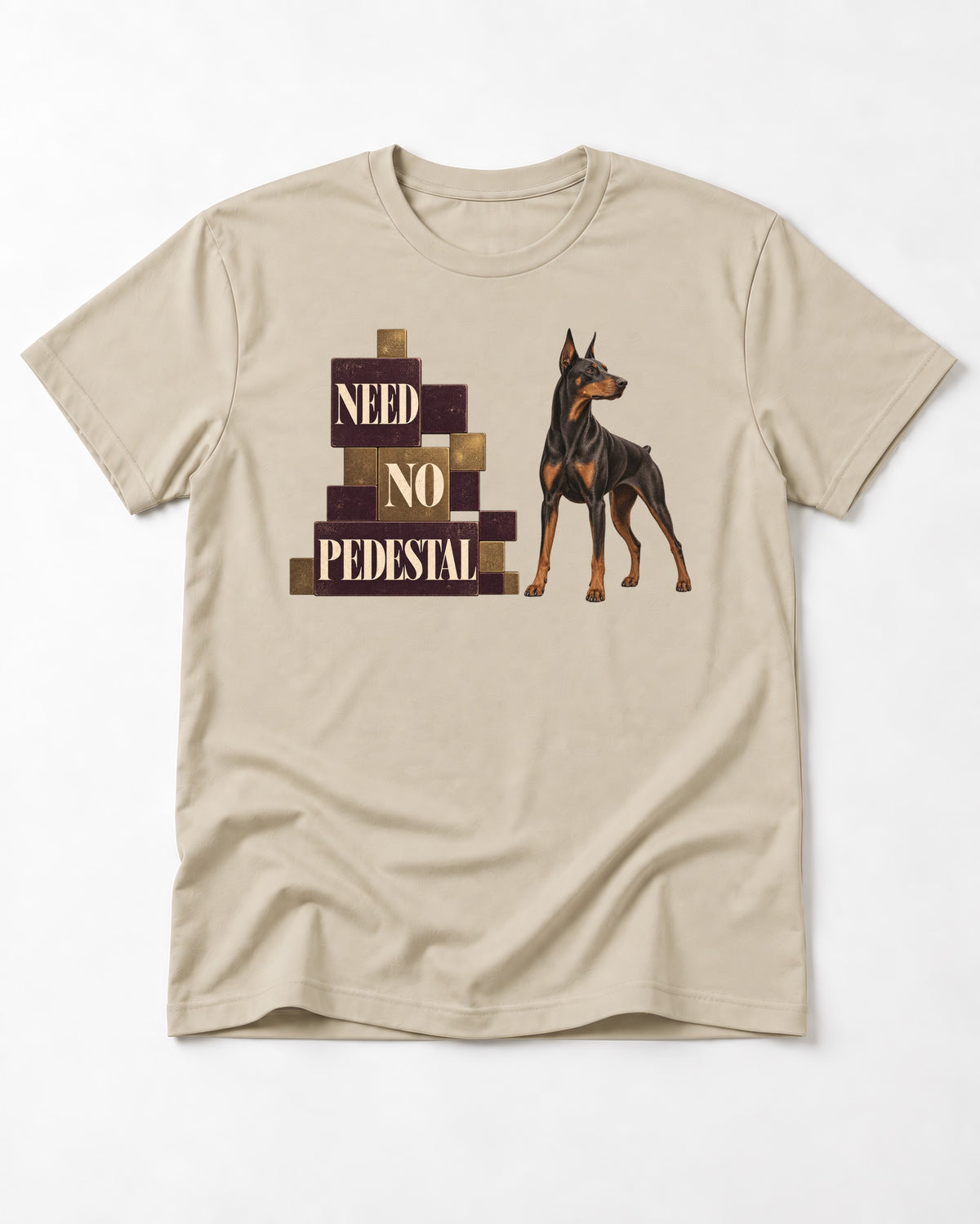 Doberman Need No Pedestal T-Shirt in Sand, flat lay product photo