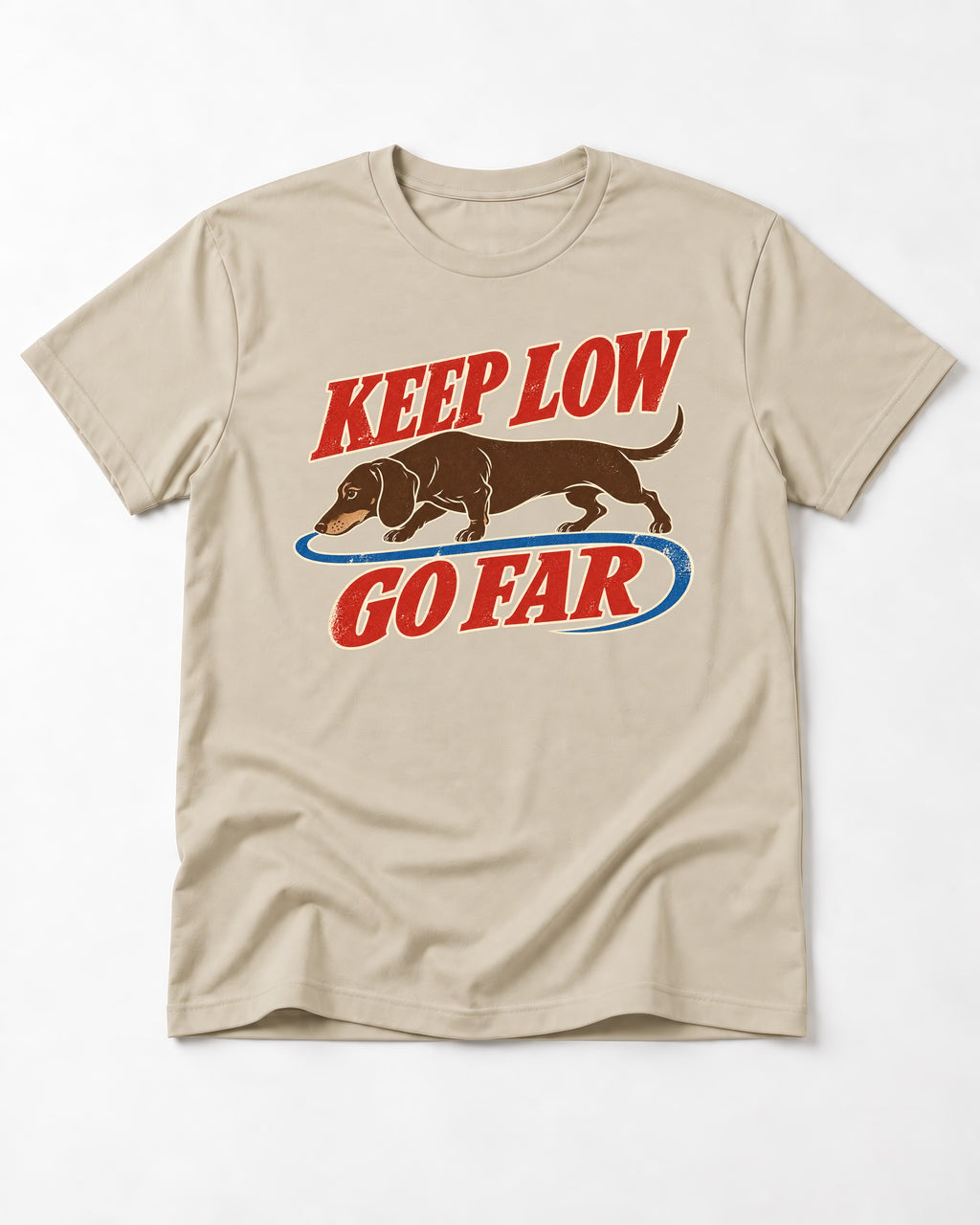 Dachshund Keep Low Go Far T-Shirt in Sand, flat lay product photo