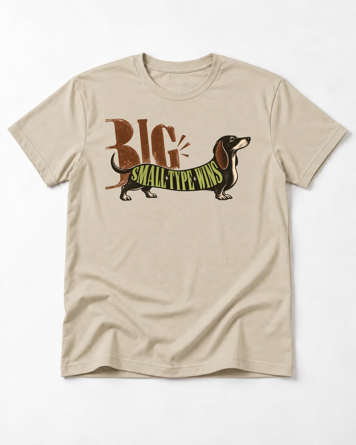 Dachshund Small Type Wins T-Shirt in Sand, flat lay product photo