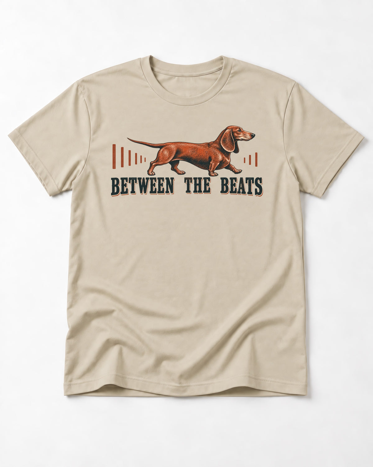 Dachshund Between the Beats T-Shirt in Sand, flat lay product photo