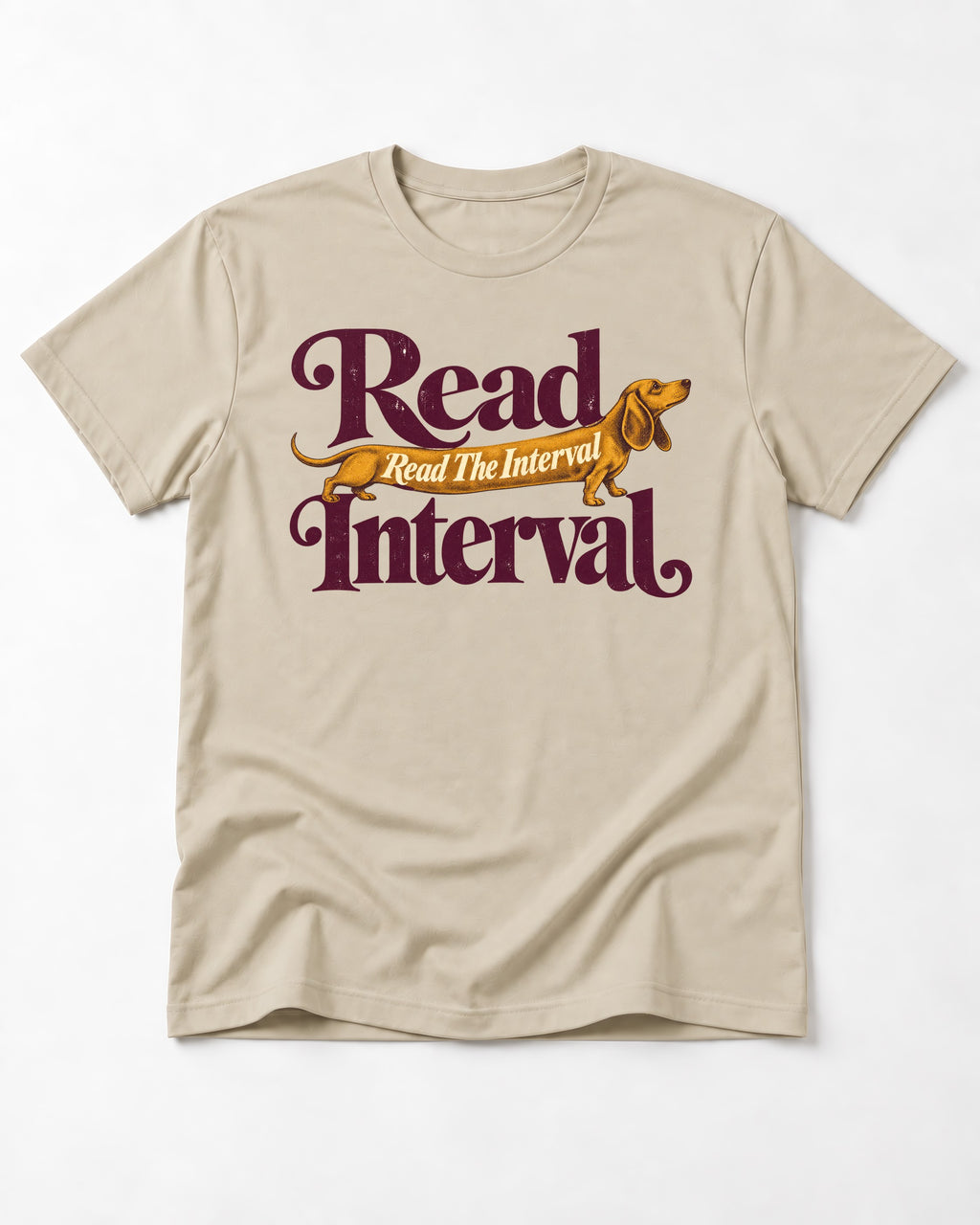 Read the Dachshund Interval T-Shirt in Sand, flat lay product photo