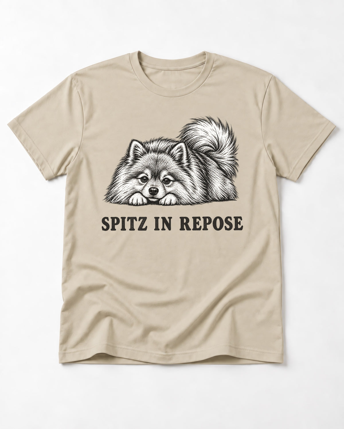 Pomeranian In Repose T-Shirt in Sand, flat lay product photo