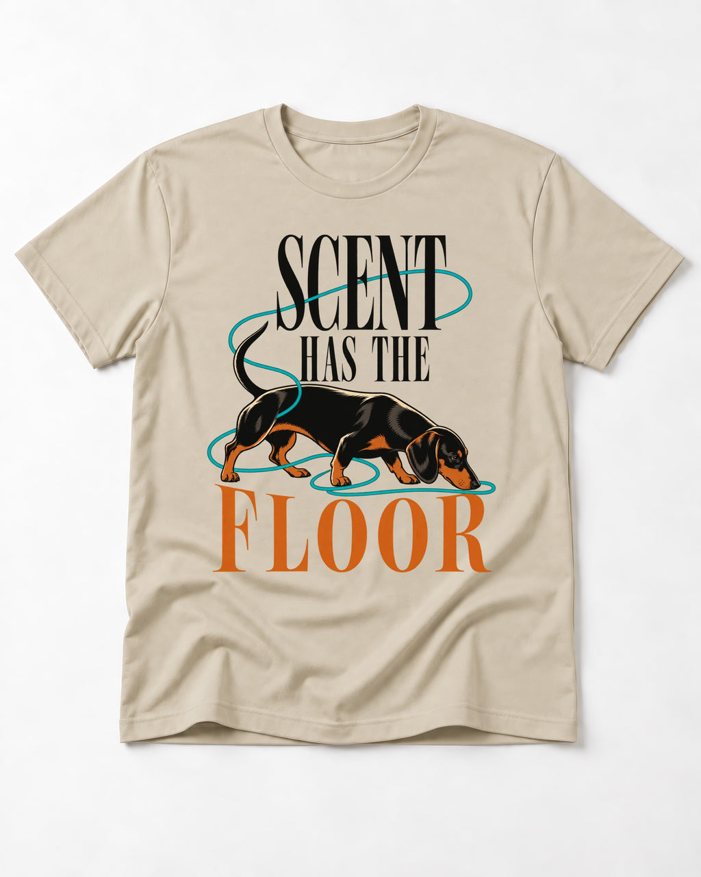 Dachshund Scent Has the Floor T-Shirt in Sand, flat lay product photo
