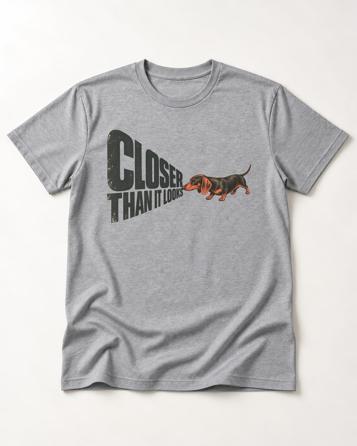Dachshund Closer Than It Looks T-Shirt in Sport Grey, flat lay product photo