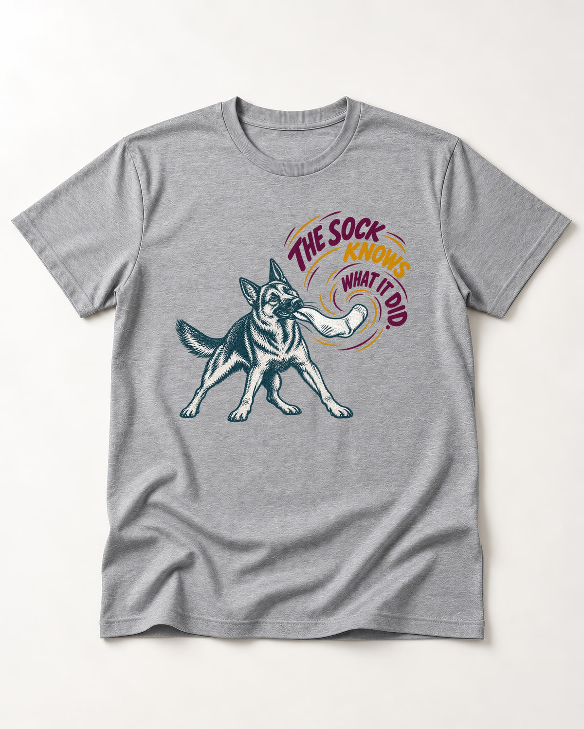 German Shepherd Dog The Sock Knows What I Did Graphic T-Shirt in Sport Grey, flat lay product photo
