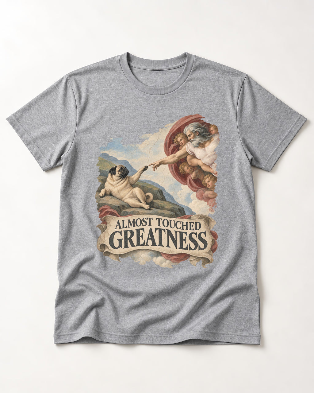 Pug Almost Touched Greatness Creation Parody Graphic T-Shirt in Sport Grey, flat lay product photo