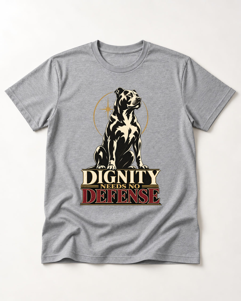 Pitbull Dignity Needs No Defense Seated Emblem Graphic T-Shirt in Sport Grey, flat lay product photo