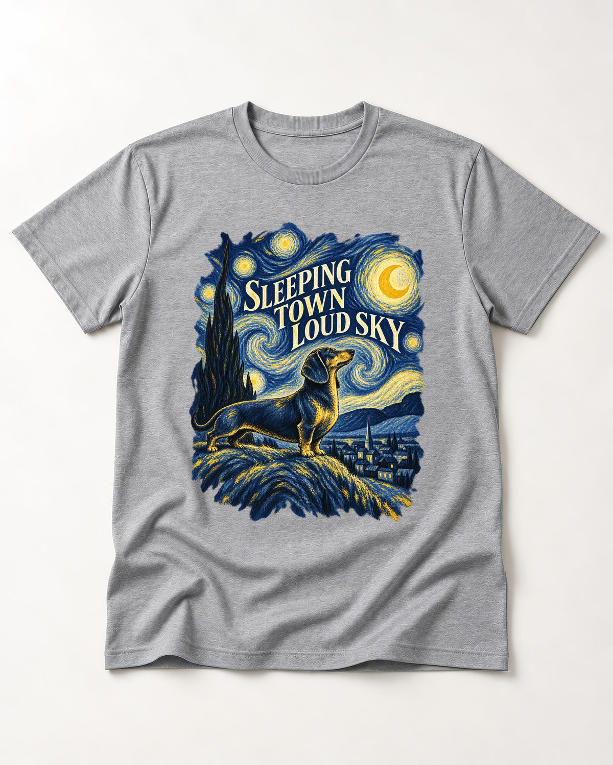 Dachshund Sleeping Town Loud Sky Starry Night Graphic T-Shirt in Sport Grey, flat lay product photo