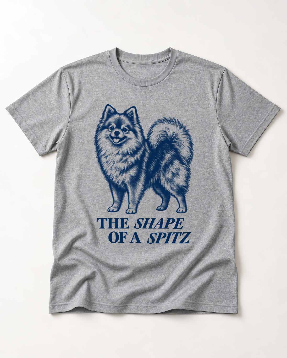 The Shape of a Pomeranian T-Shirt in Sport Grey, flat lay product photo