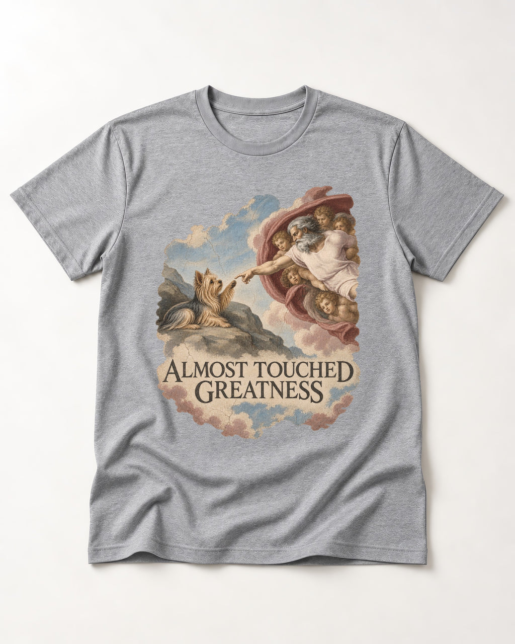 Yorkshire Terrier Almost Touched Greatness Creation Parody Graphic T-Shirt in Sport Grey, flat lay product photo