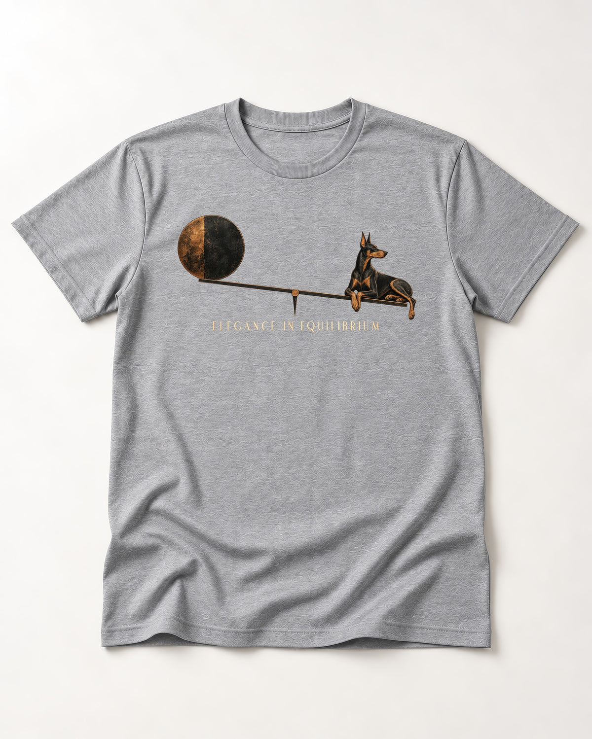 Doberman Elegance in Equilibrium Balance Graphic T-Shirt in Sport Grey, flat lay product photo