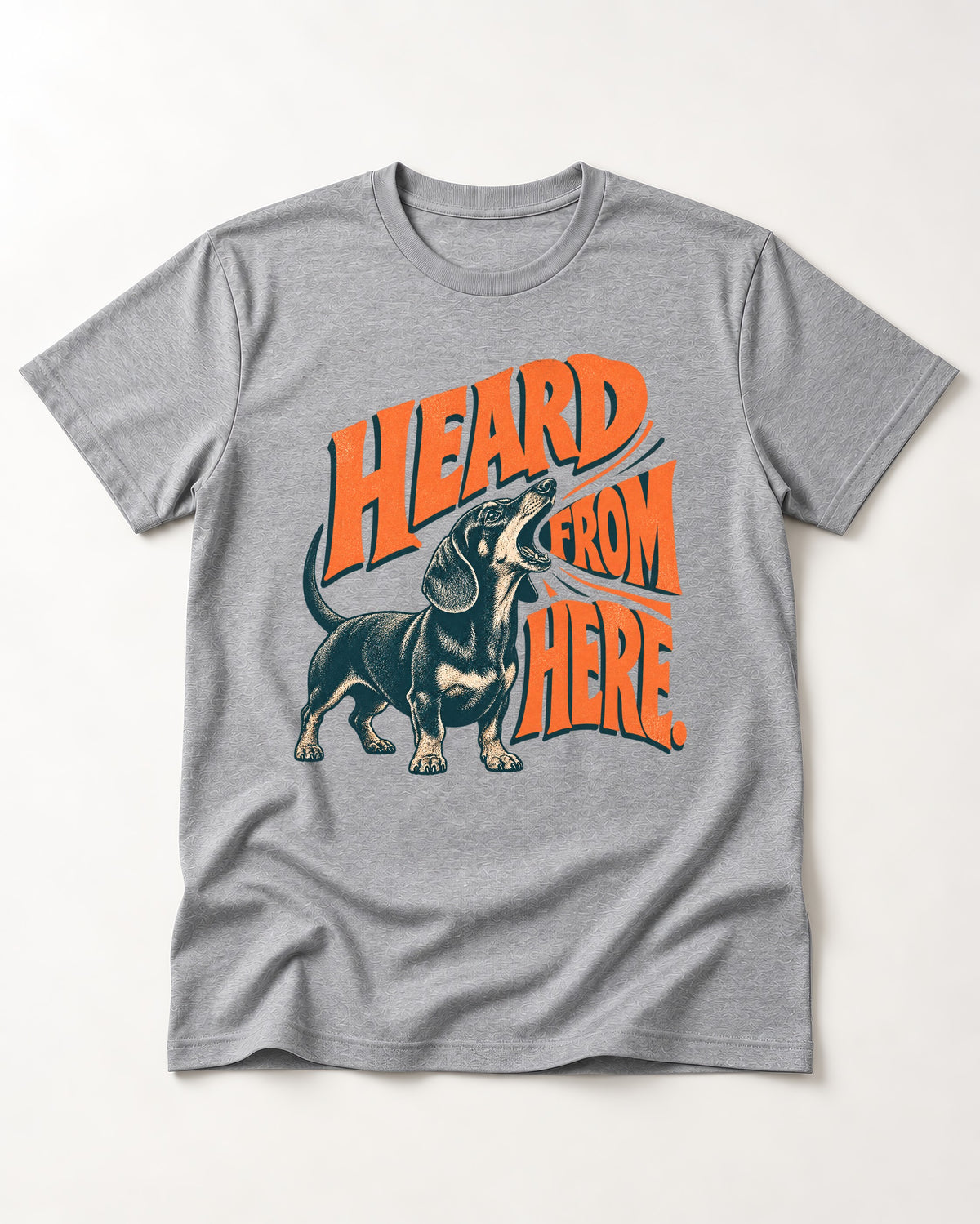 Dachshund Heard From Here T-Shirt in Sport Grey, flat lay product photo